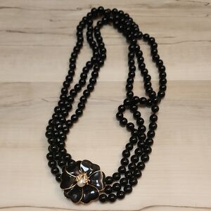 Elegant Black Beaded Necklace with Floral Accent